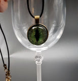 GREEN WITH ANTIQUE BRONZE DRAGONS EYE